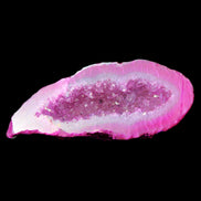 Magenta dyed Agate geode 54*22*11mm 16g in sunlight - Rocks and Things Store