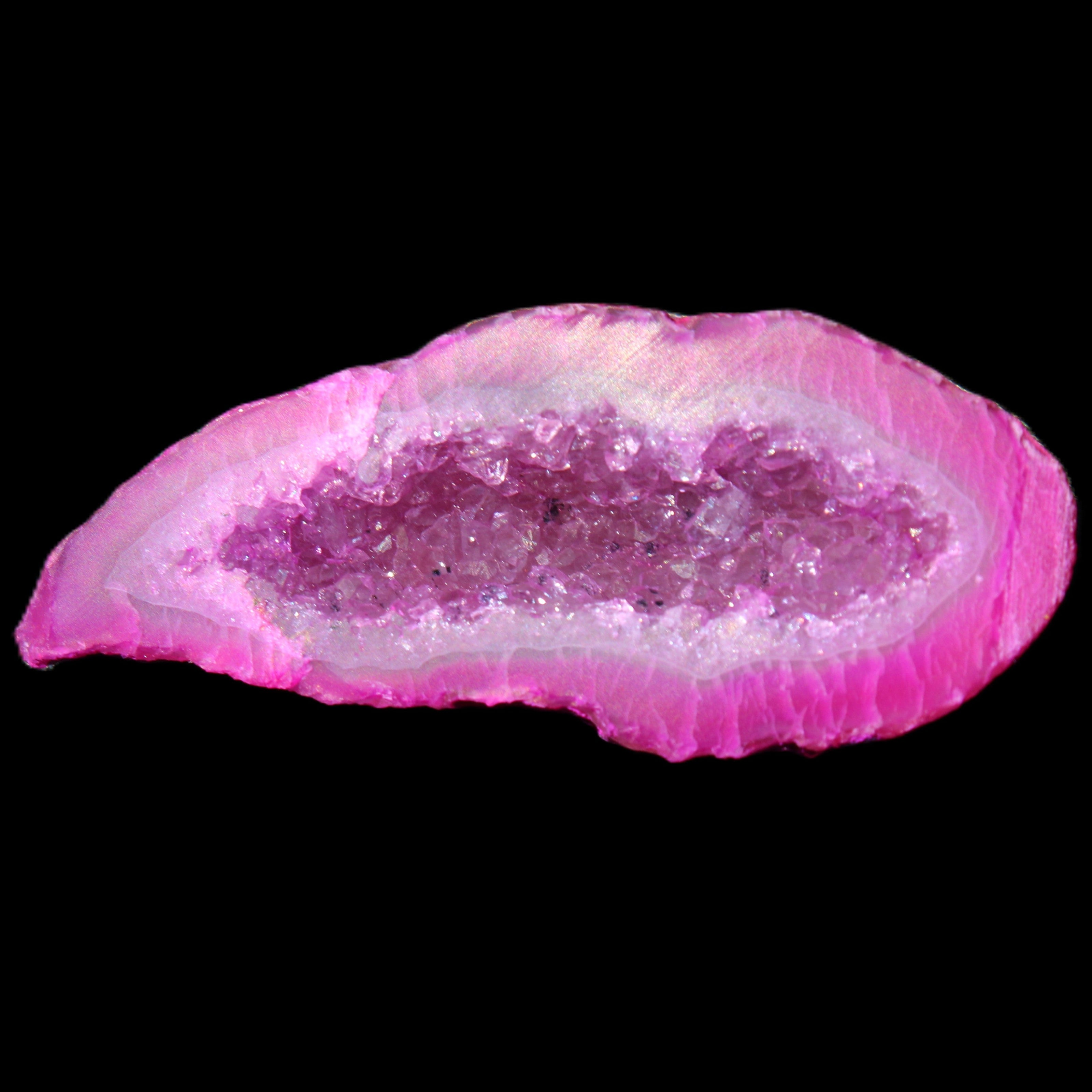 Magenta dyed Agate geode 54*22*11mm 16g in sunlight - Rocks and Things Store