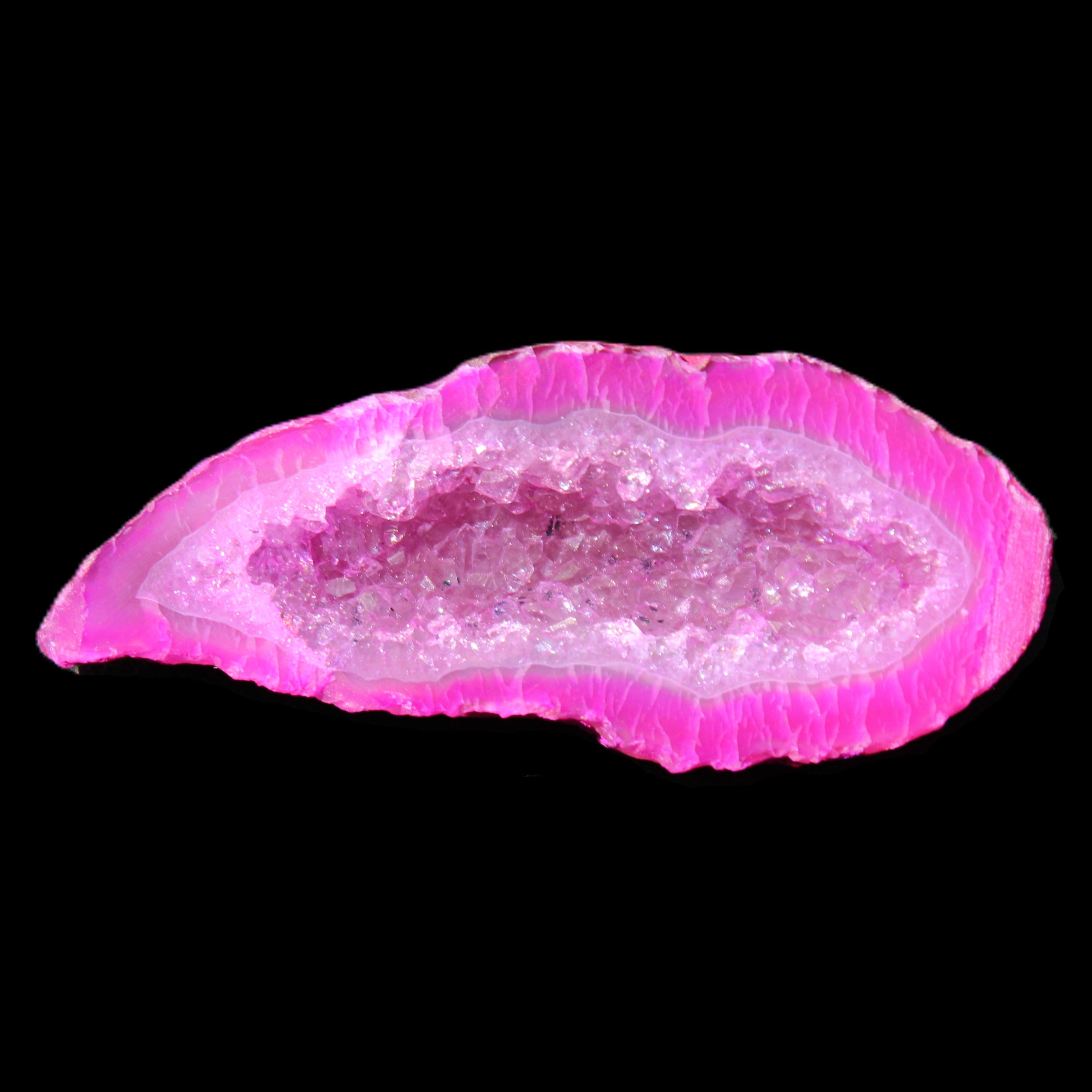 Magenta dyed Agate geode 54*22*11mm 16g in sunlight - Rocks and Things Store