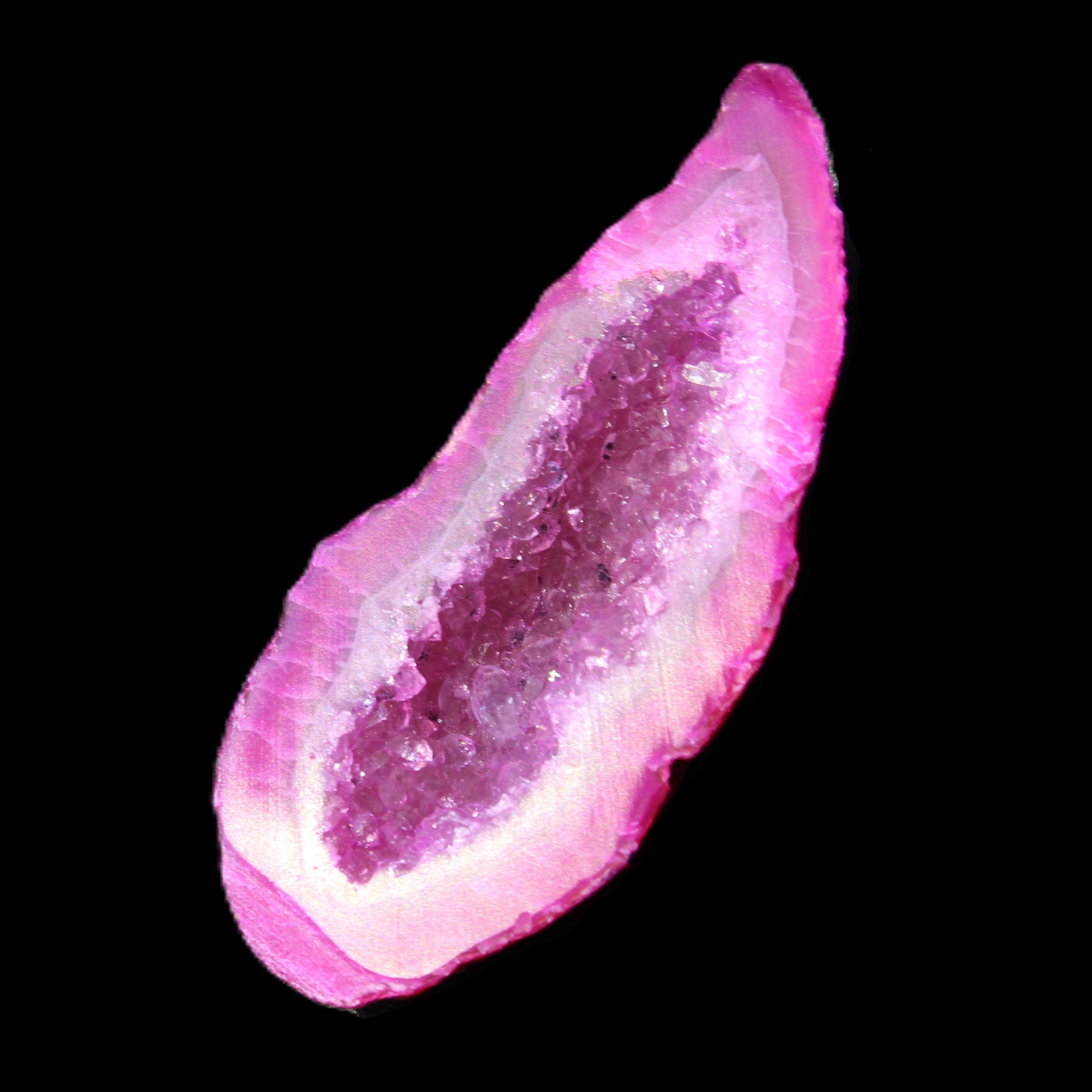 Magenta dyed Agate geode 54*22*11mm 16g in sunlight - Rocks and Things Store