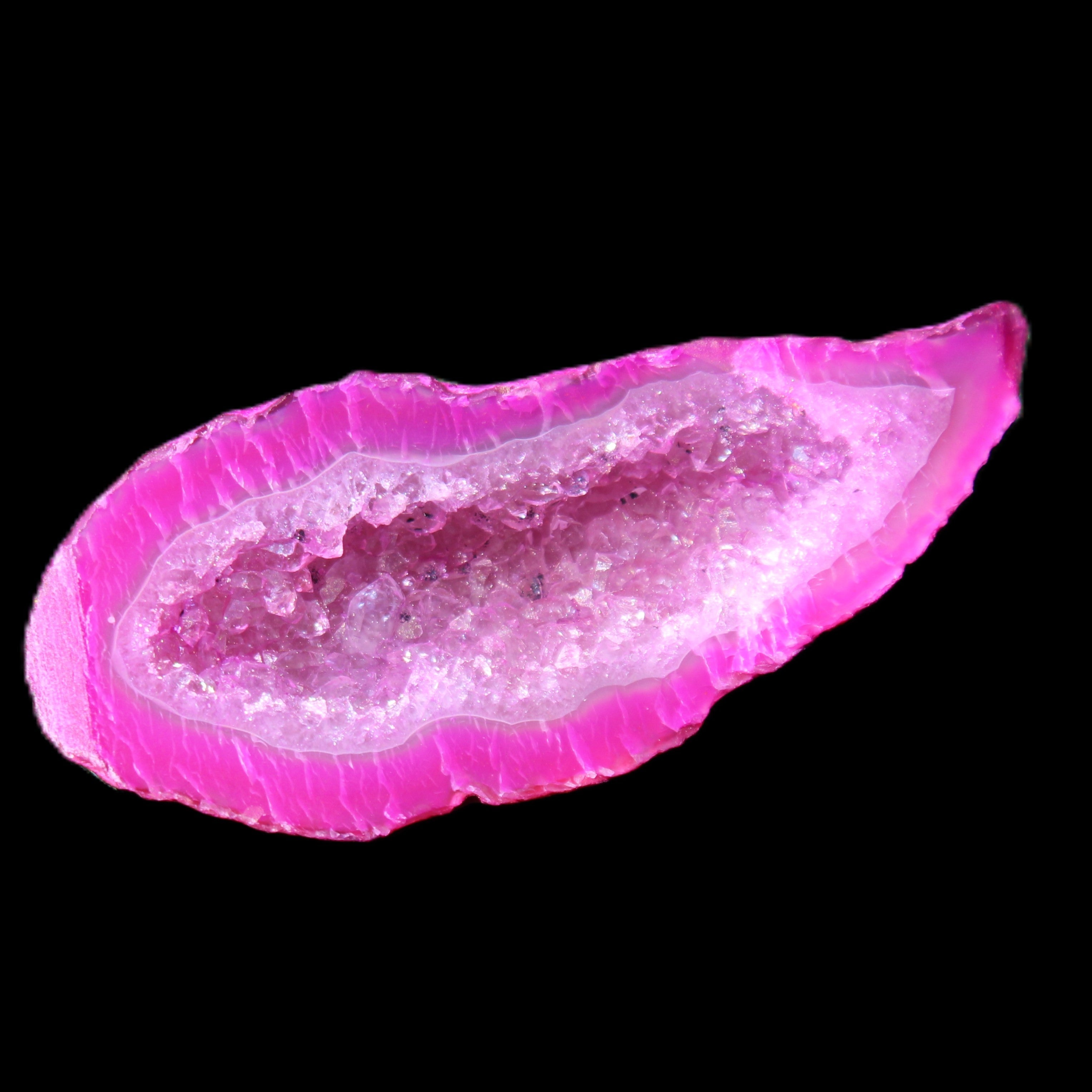 Magenta dyed Agate geode 54*22*11mm 16g in sunlight - Rocks and Things Store