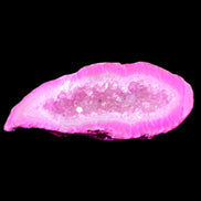 Magenta dyed Agate geode 54*22*11mm 16g in sunlight - Rocks and Things Store