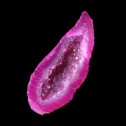 Magenta dyed Agate geode 54*22*11mm 16g in sunlight - Rocks and Things Store
