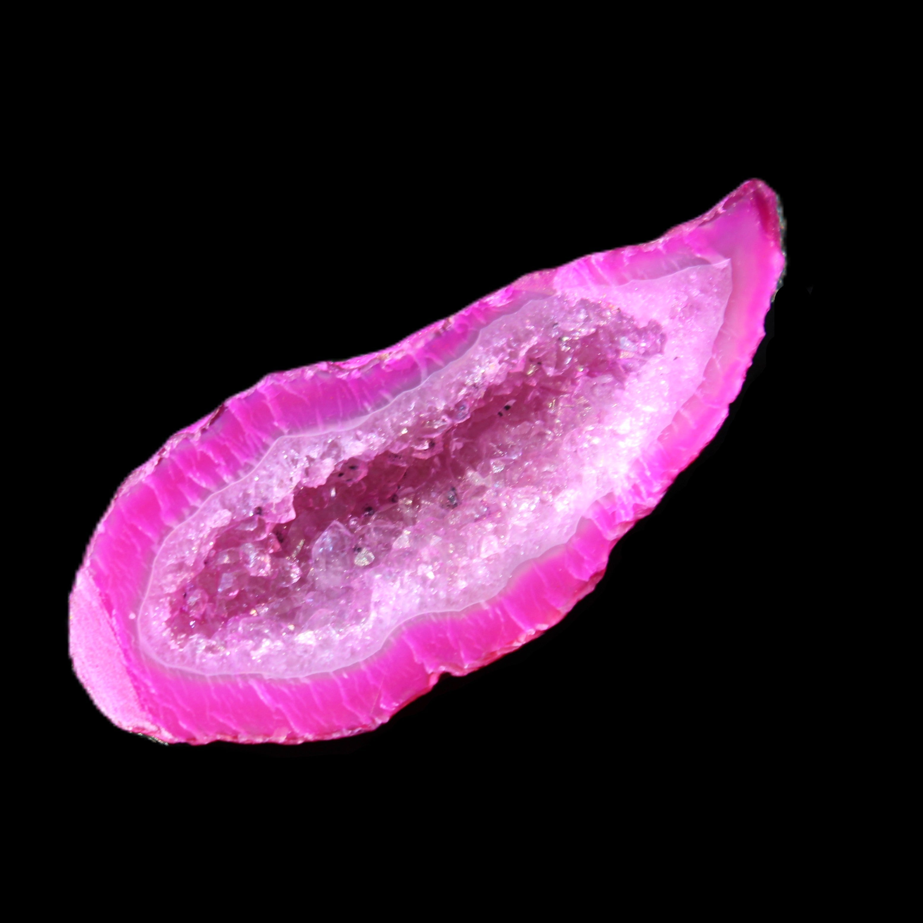 Magenta dyed Agate geode 54*22*11mm 16g in sunlight - Rocks and Things Store