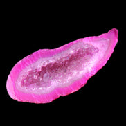 Magenta dyed Agate geode 54*22*11mm 16g in sunlight - Rocks and Things Store