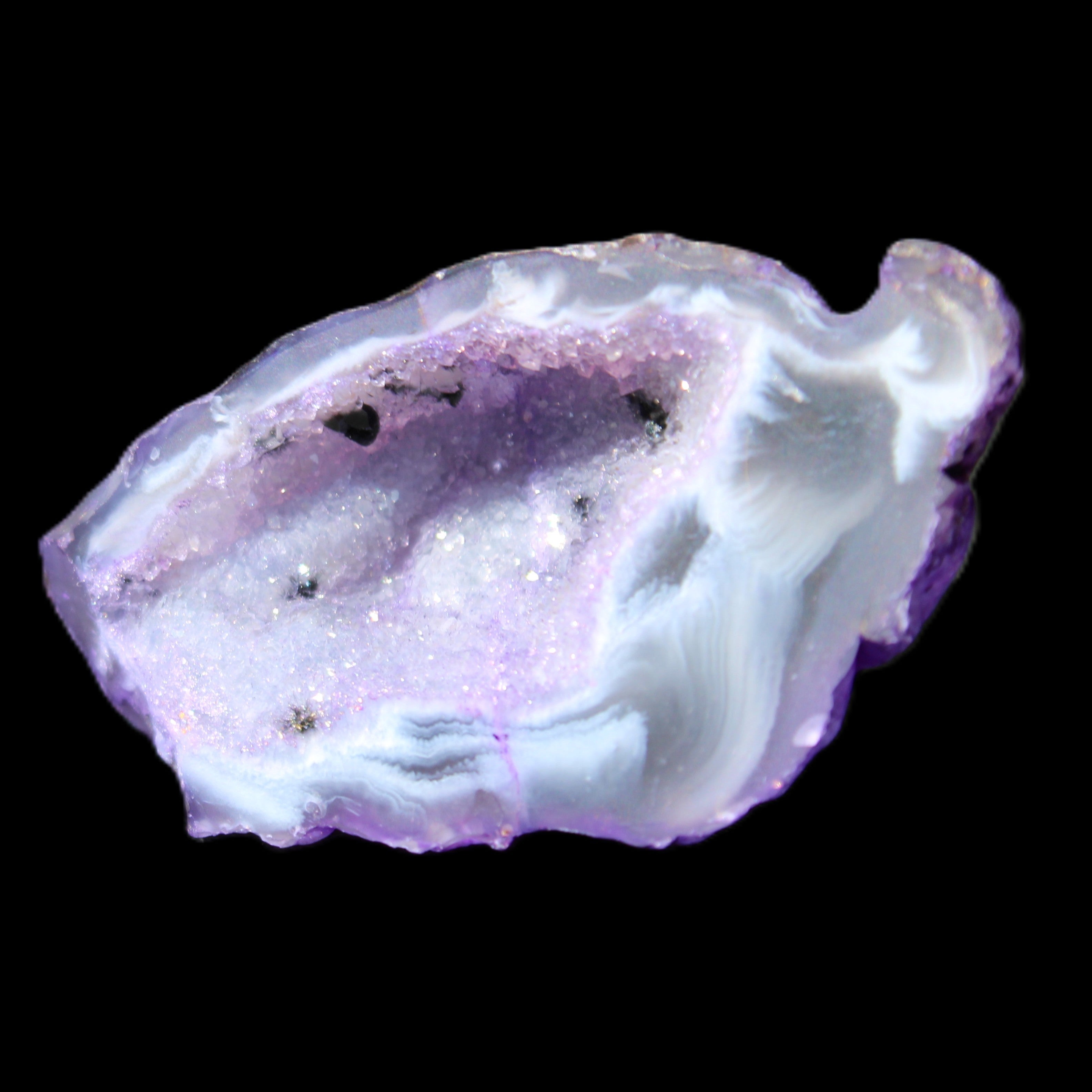 Violet dyed Agate geode 44*25*19mm 21g in sunlight - Rocks and Things Store