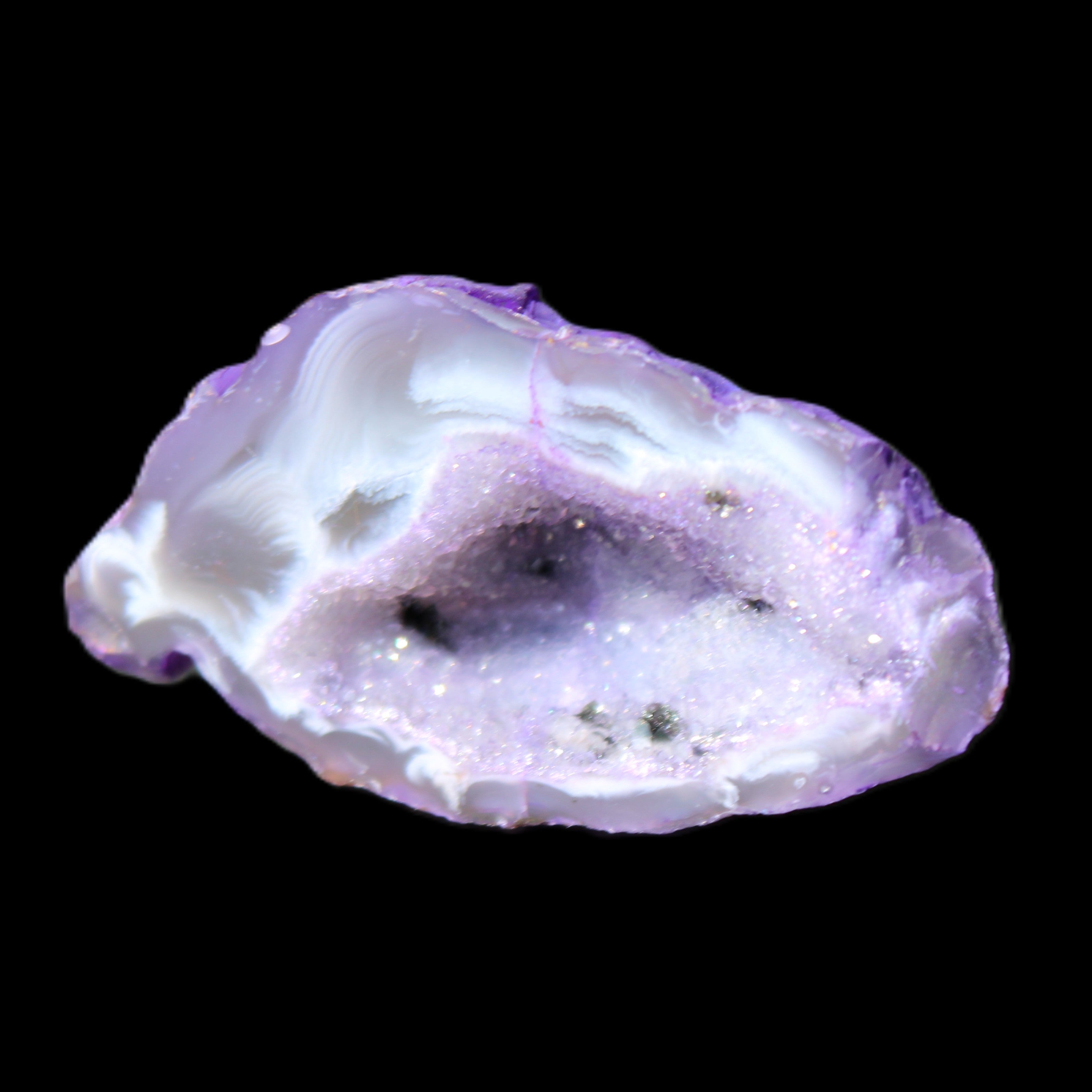 Violet dyed Agate geode 44*25*19mm 21g in sunlight - Rocks and Things Store