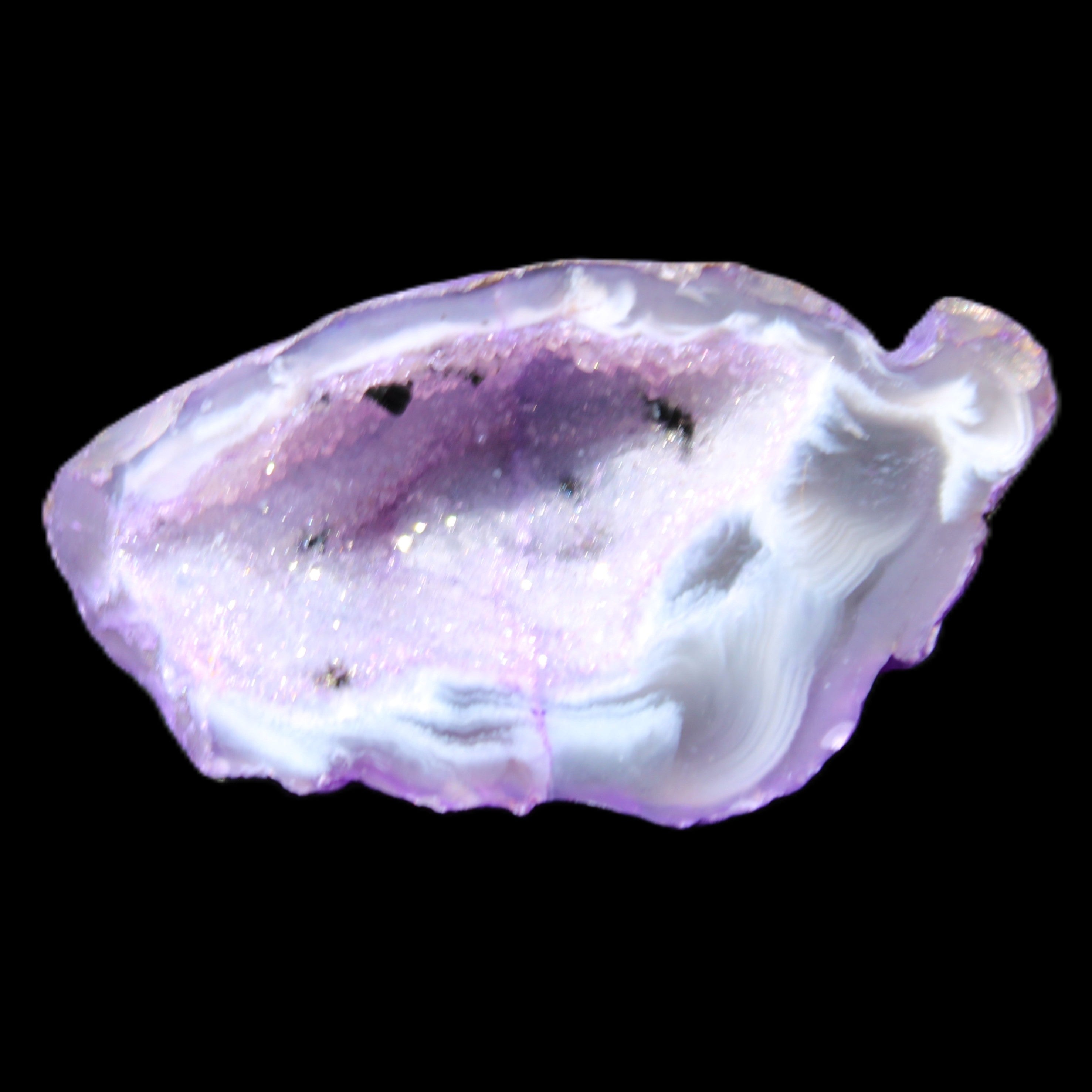 Violet dyed Agate geode 44*25*19mm 21g in sunlight - Rocks and Things Store