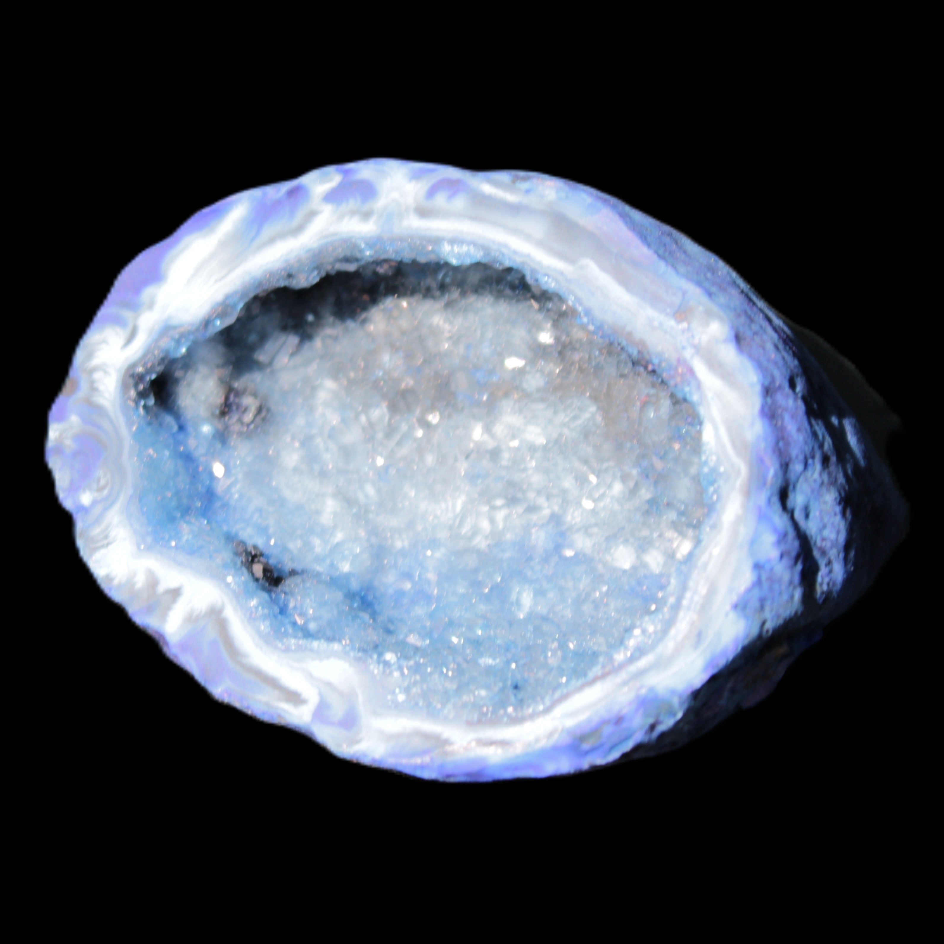 Blue dyed Agate geode 47*37*21mm 35g in sunlight - Rocks and Things Store
