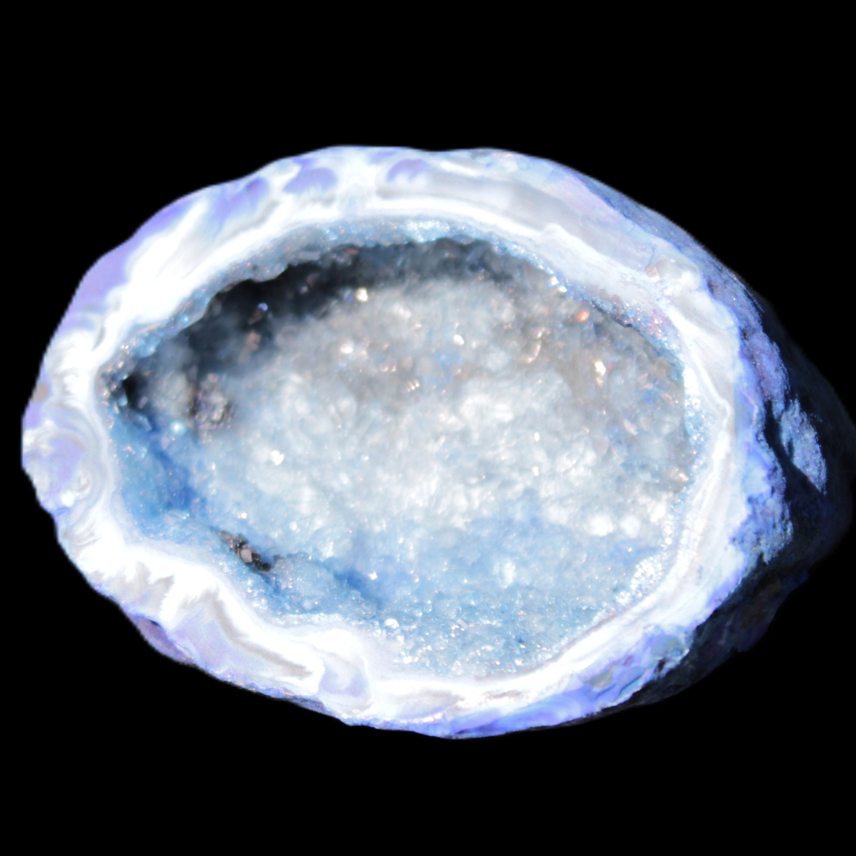 Blue dyed Agate geode 47*37*21mm 35g in sunlight - Rocks and Things Store
