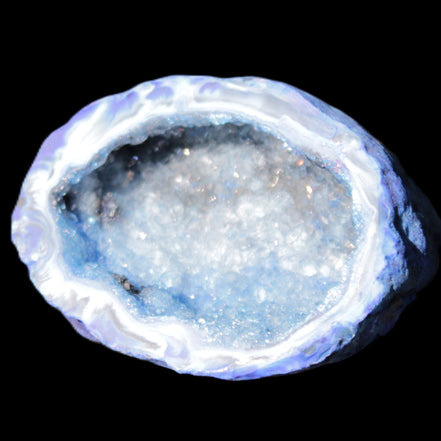 Blue dyed Agate geode 47*37*21mm 35g in sunlight - Rocks and Things Store