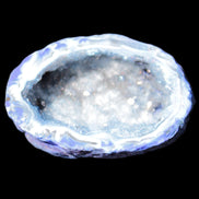 Blue dyed Agate geode 47*37*21mm 35g in sunlight - Rocks and Things Store