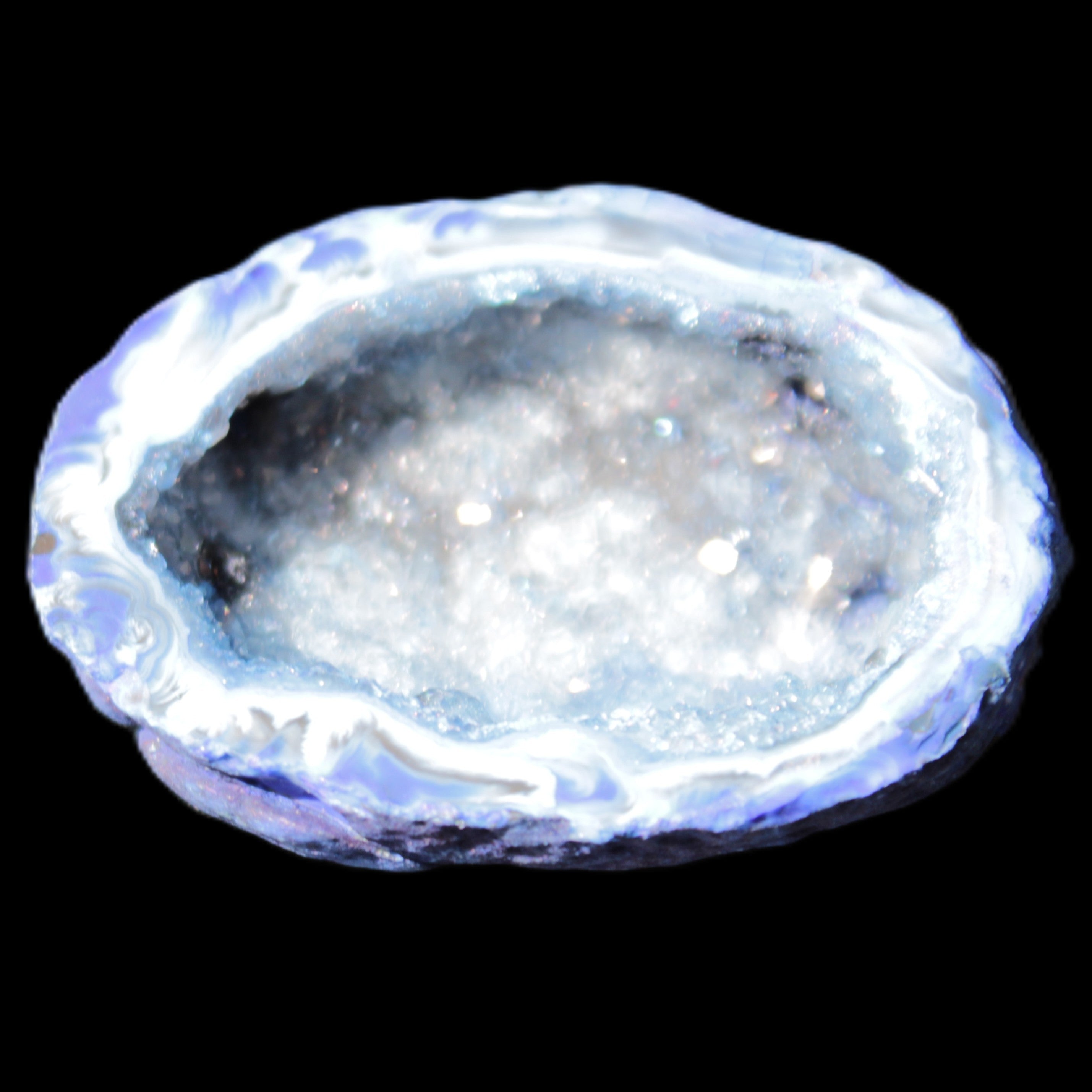 Blue dyed Agate geode 47*37*21mm 35g in sunlight - Rocks and Things Store