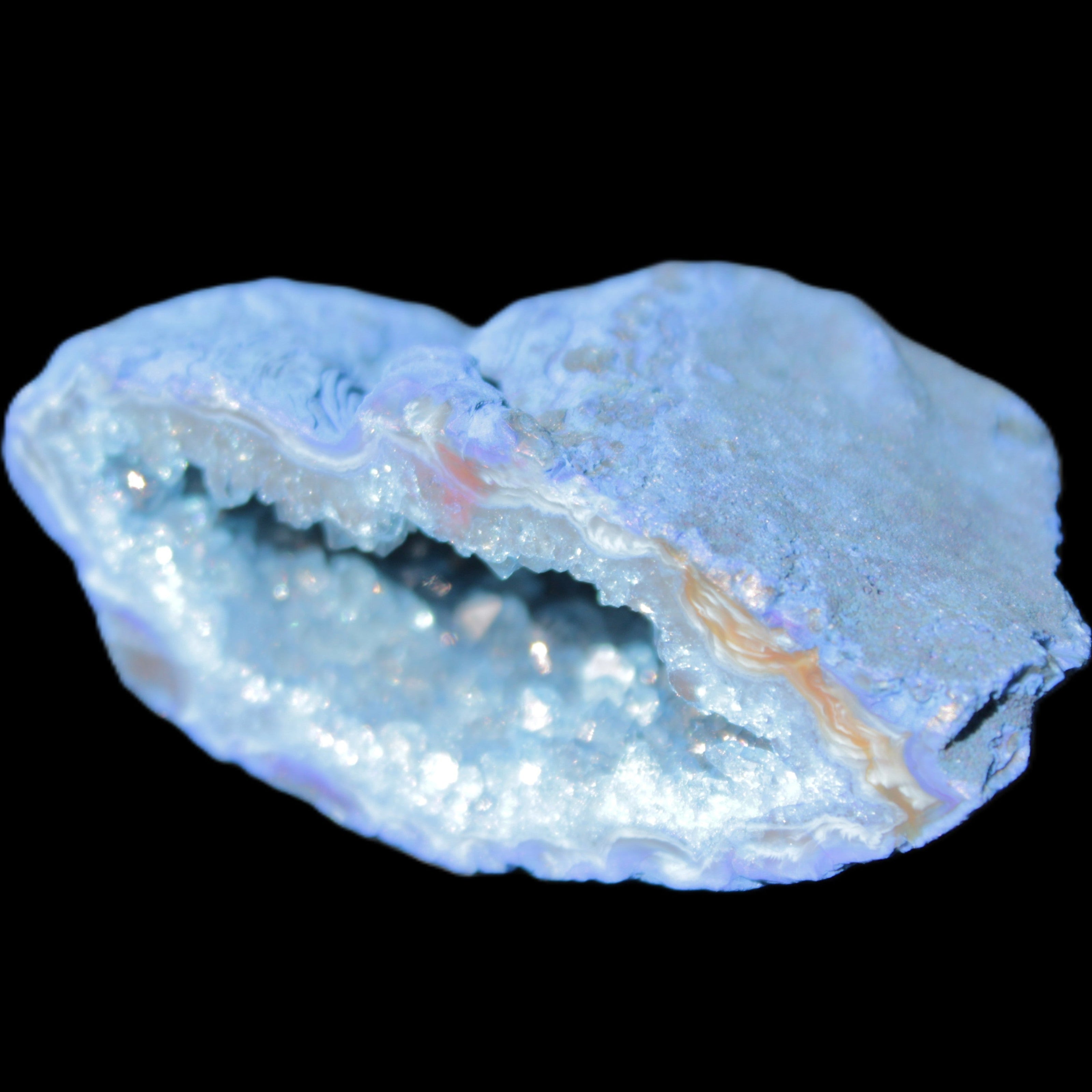 Blue dyed Agate geode 50*22*30mm 30g in sunlight - Rocks and Things Store