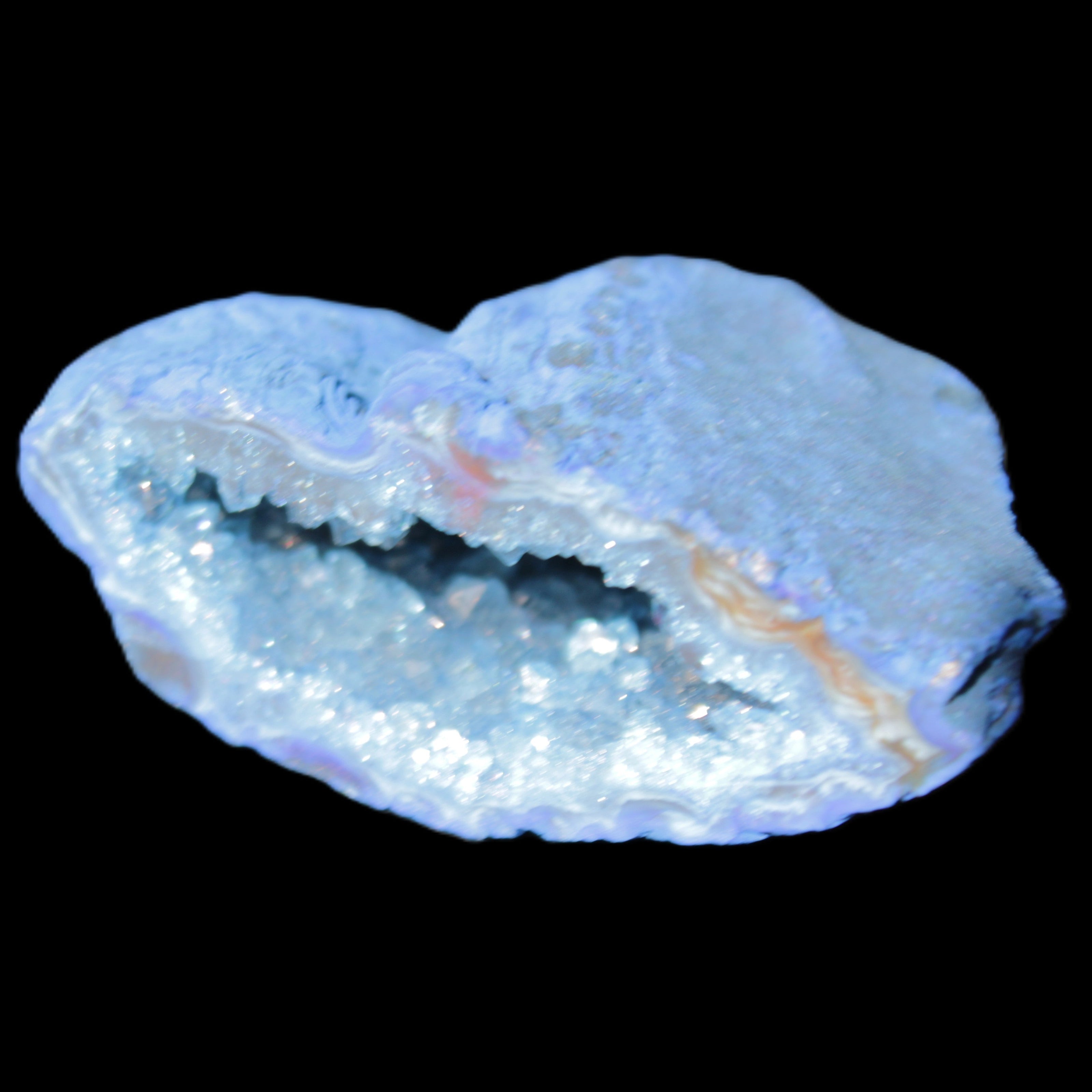 Blue dyed Agate geode 50*22*30mm 30g in sunlight - Rocks and Things Store