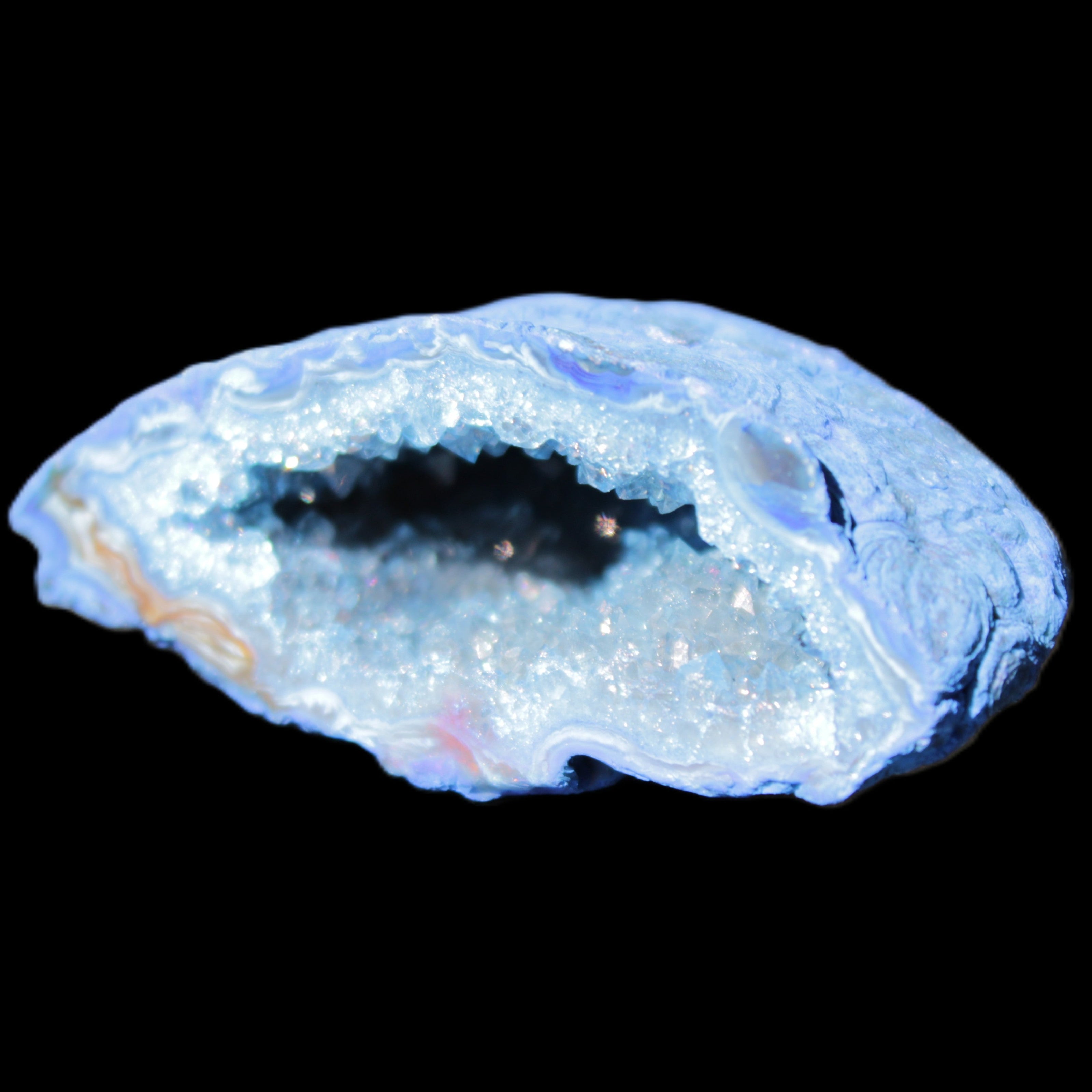 Blue dyed Agate geode 50*22*30mm 30g in sunlight - Rocks and Things Store