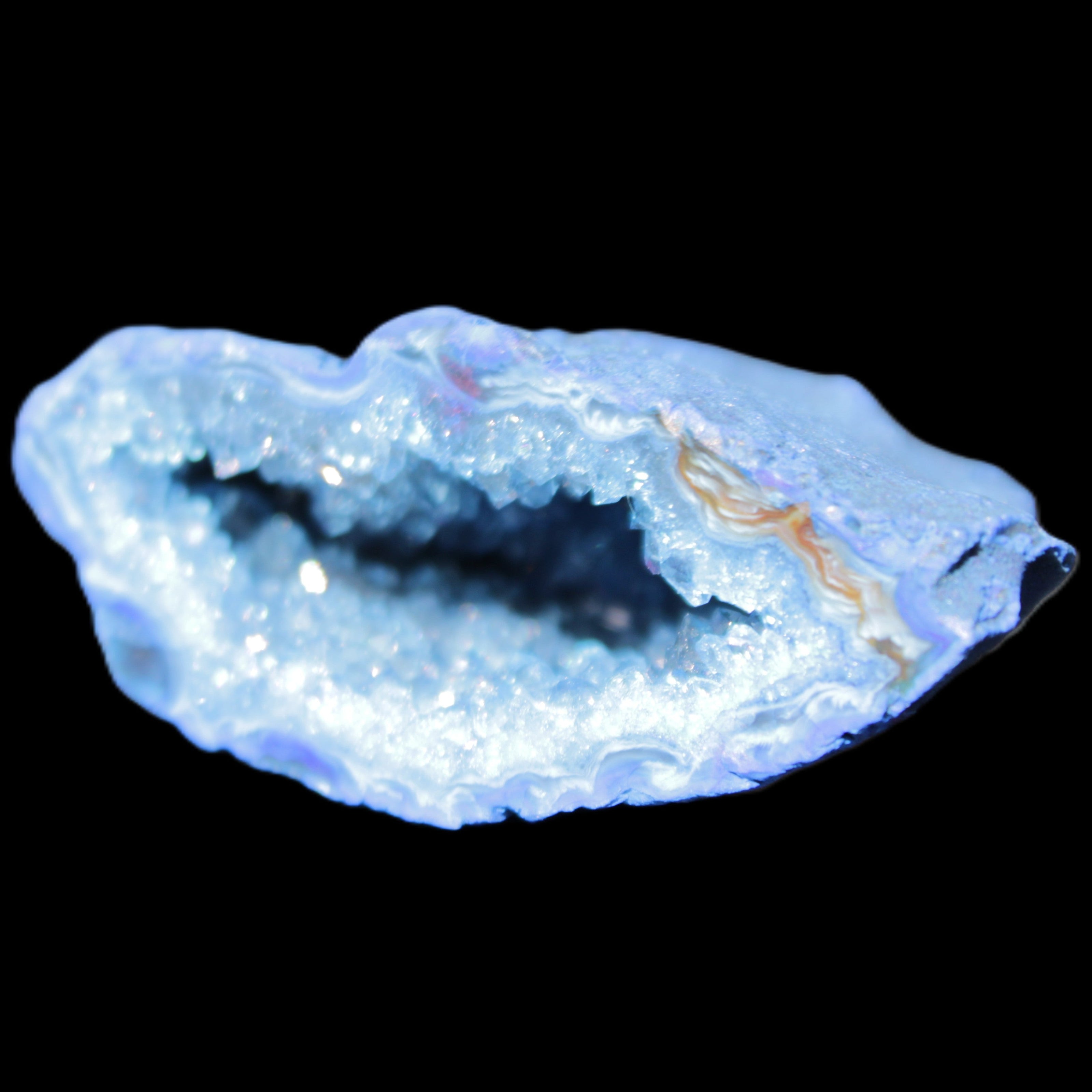 Blue dyed Agate geode 50*22*30mm 30g in sunlight - Rocks and Things Store