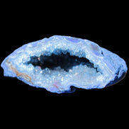 Blue dyed Agate geode 50*22*30mm 30g in sunlight - Rocks and Things Store