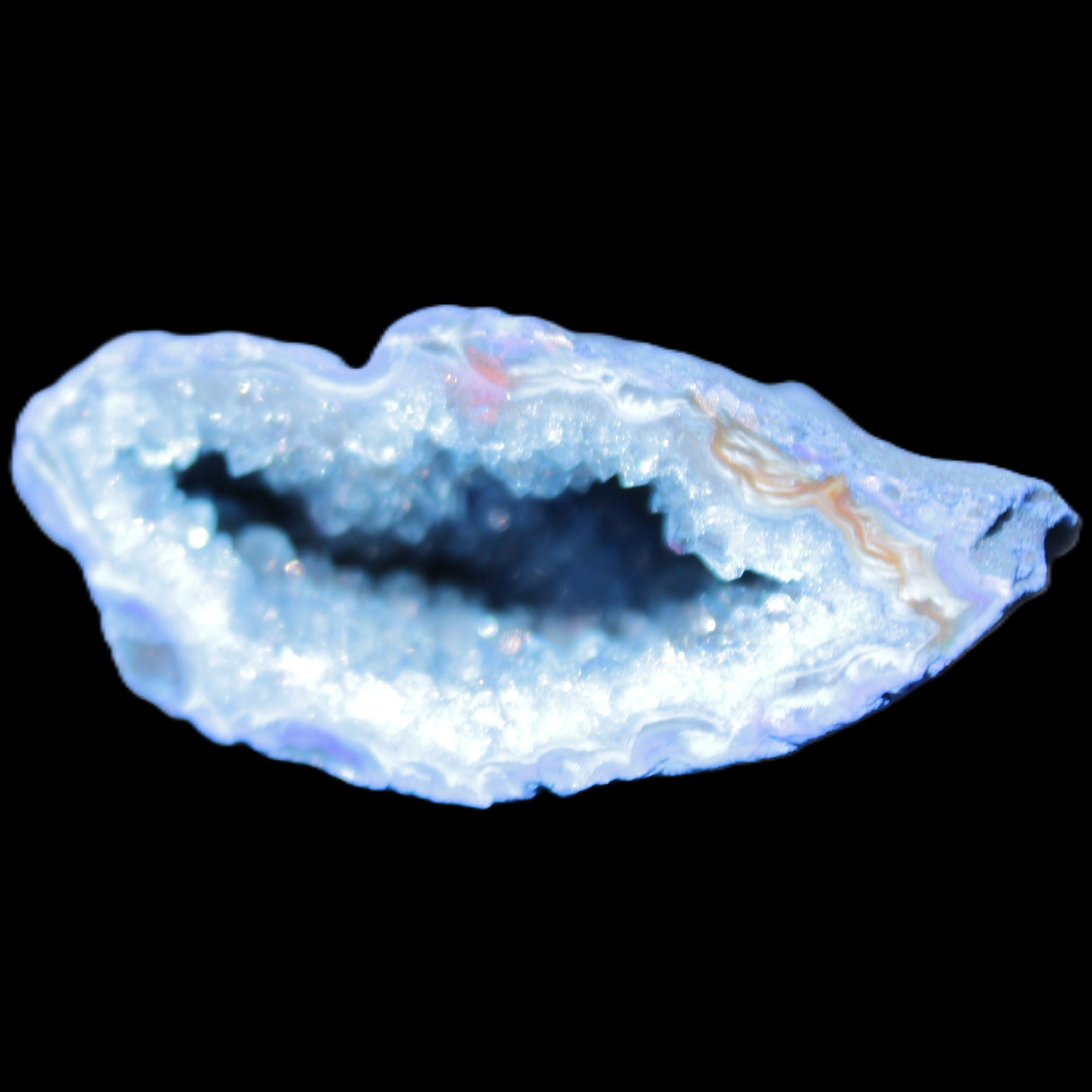 Blue dyed Agate geode 50*22*30mm 30g in sunlight - Rocks and Things Store
