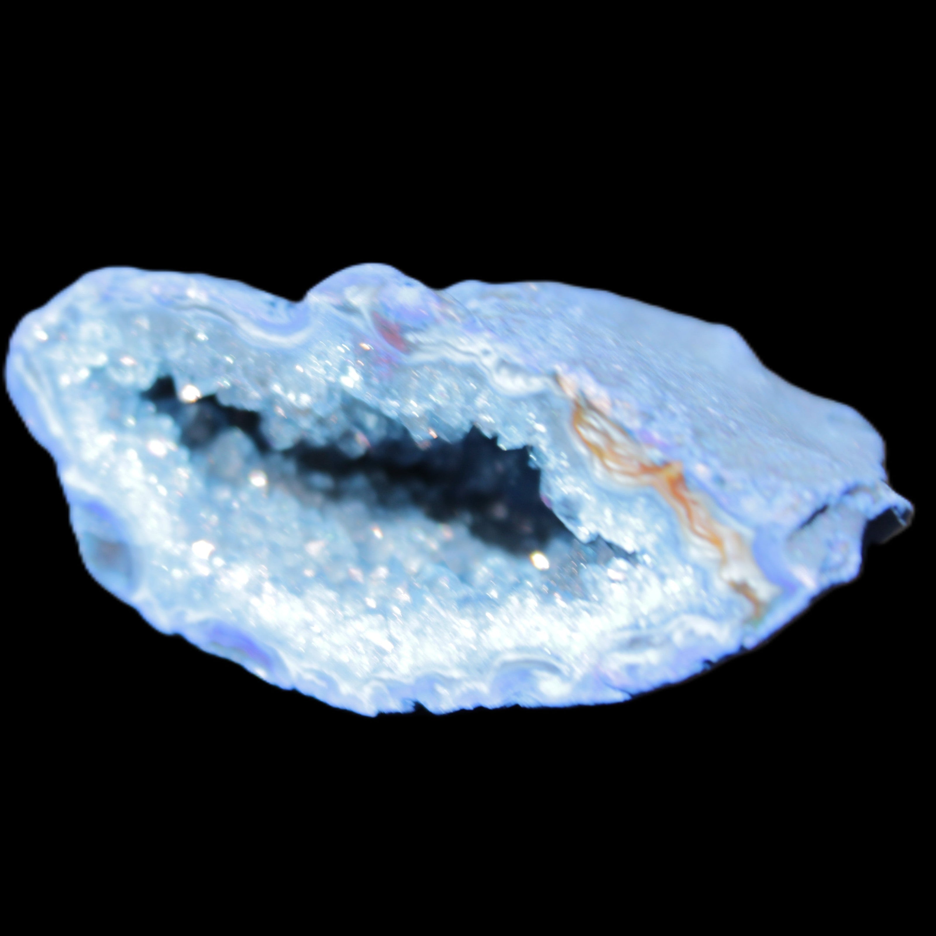 Blue dyed Agate geode 50*22*30mm 30g in sunlight - Rocks and Things Store