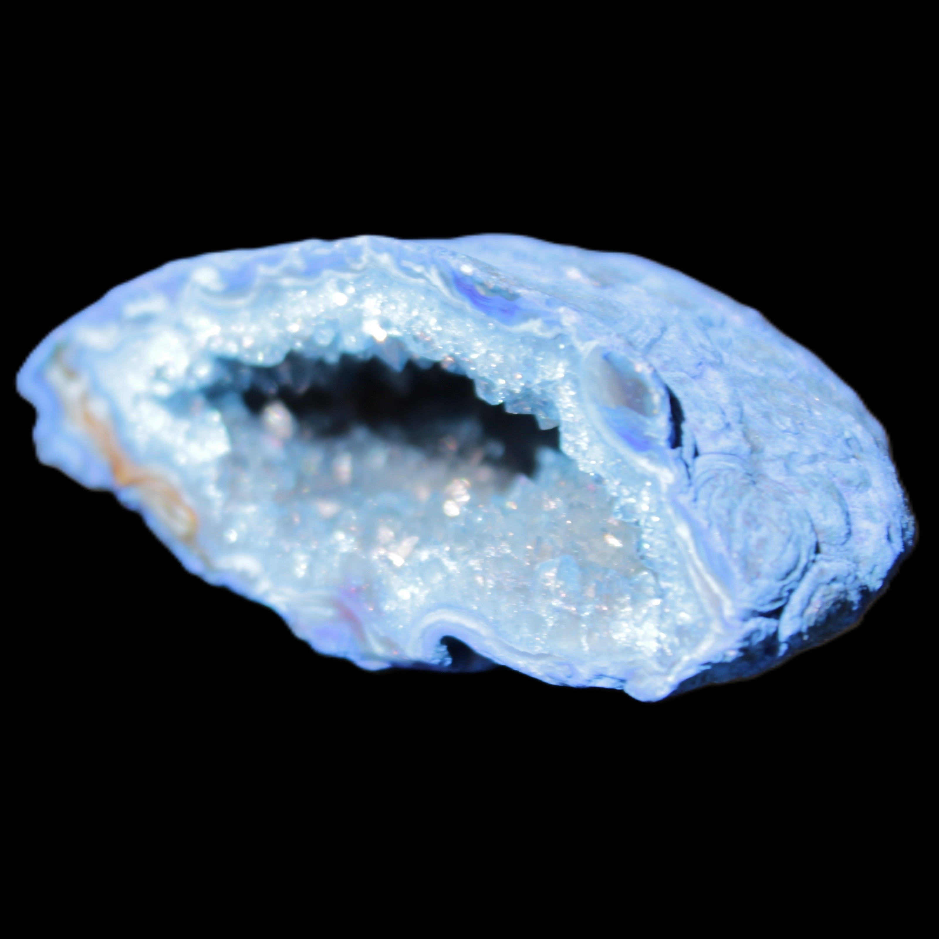Blue dyed Agate geode 50*22*30mm 30g in sunlight - Rocks and Things Store