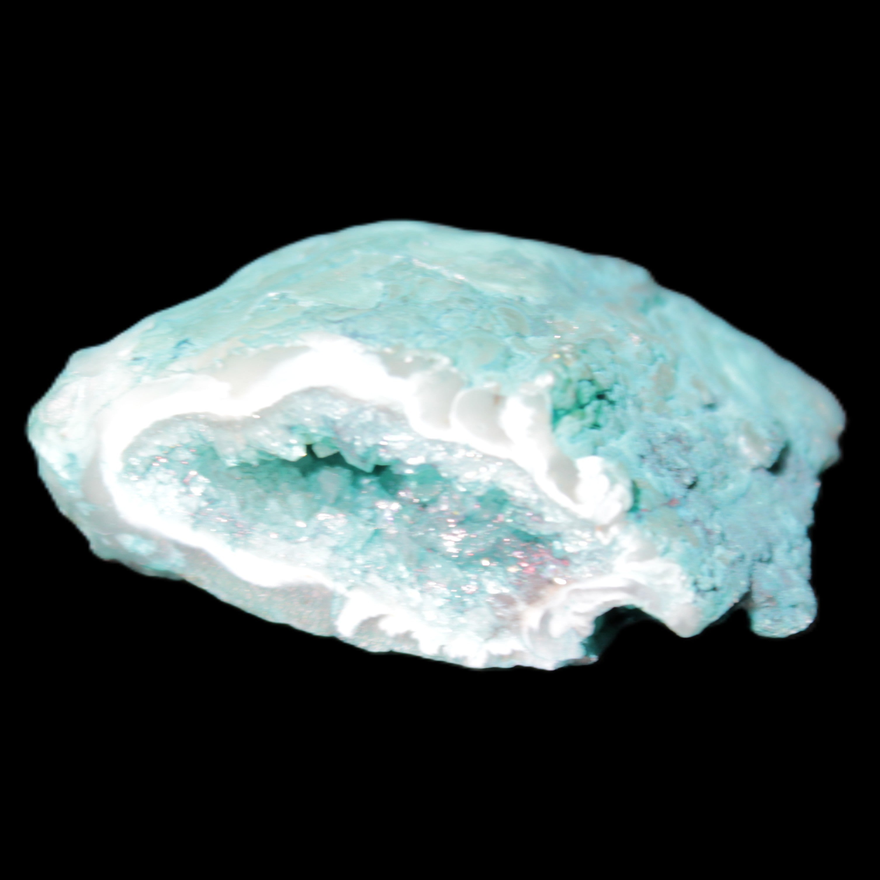 Green dyed Agate geode 42*20*31mm 26g in sunlight - Rocks and Things Store
