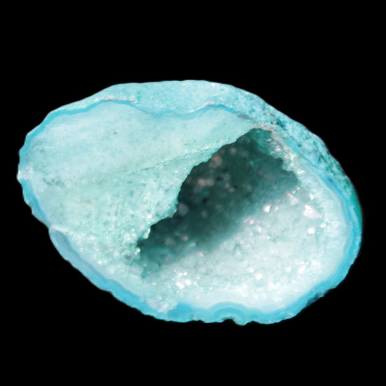Green dyed Agate geode 40*27*20mm 16g in sunlight - Rocks and Things Store