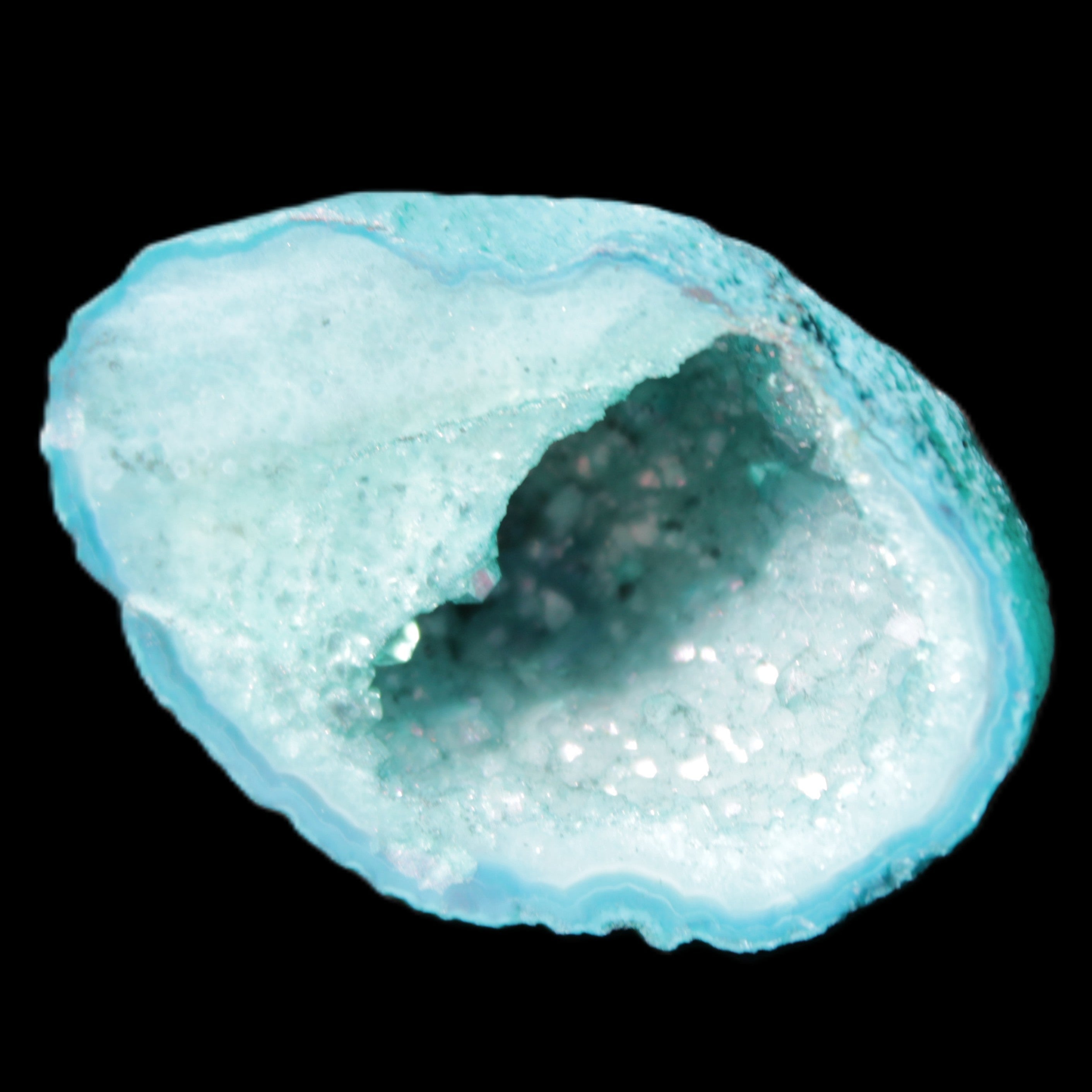 Green dyed Agate geode 40*27*20mm 16g in sunlight - Rocks and Things Store