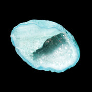 Green dyed Agate geode 40*27*20mm 16g in sunlight - Rocks and Things Store