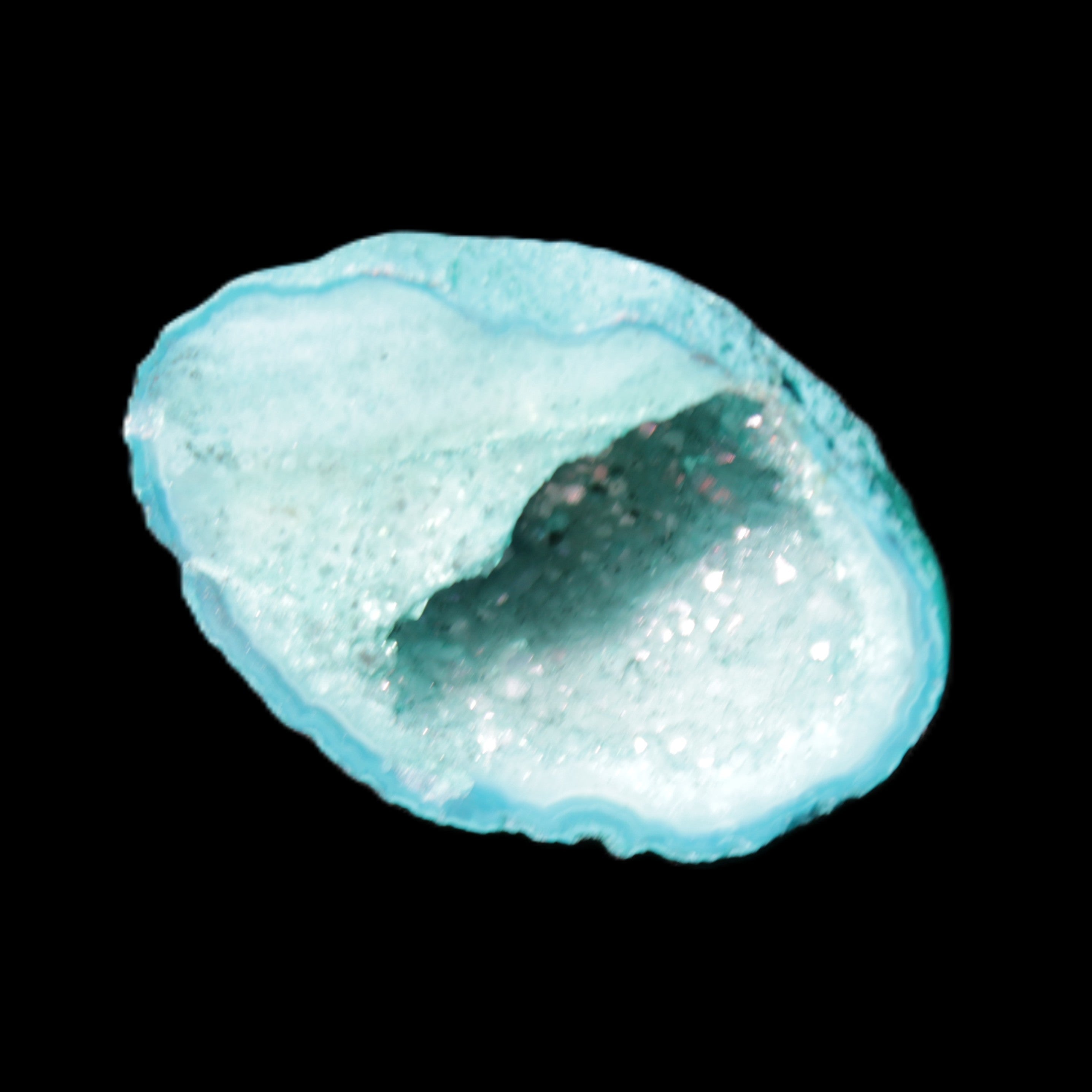 Green dyed Agate geode 40*27*20mm 16g in sunlight - Rocks and Things Store