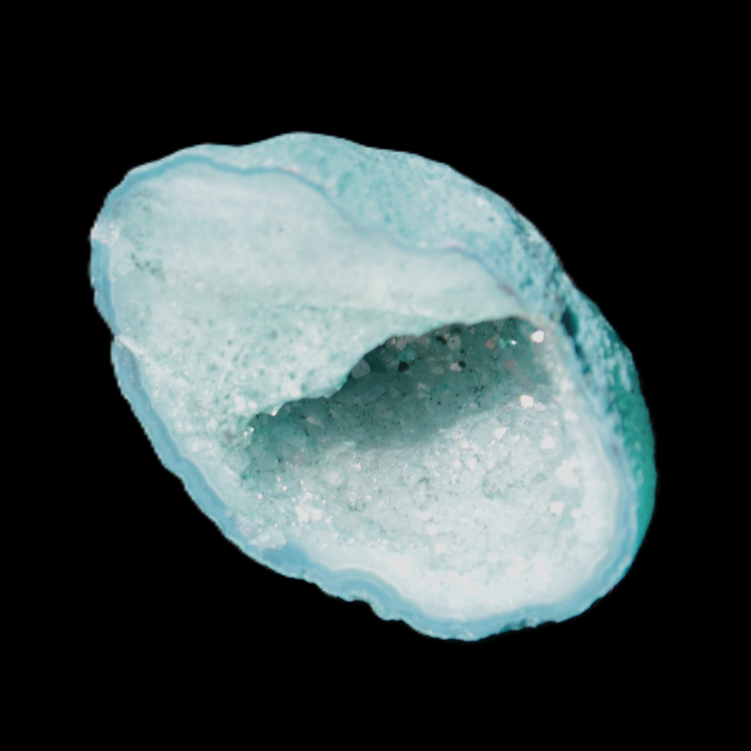 Green dyed Agate geode 40*27*20mm 16g in sunlight - Rocks and Things Store
