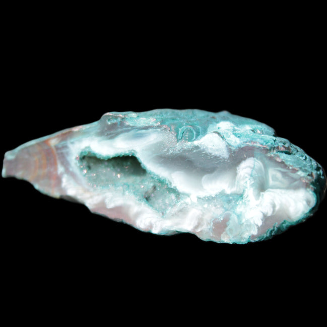 Green dyed Agate geode 45*15*22mm 21g in sunlight - Rocks and Things Store