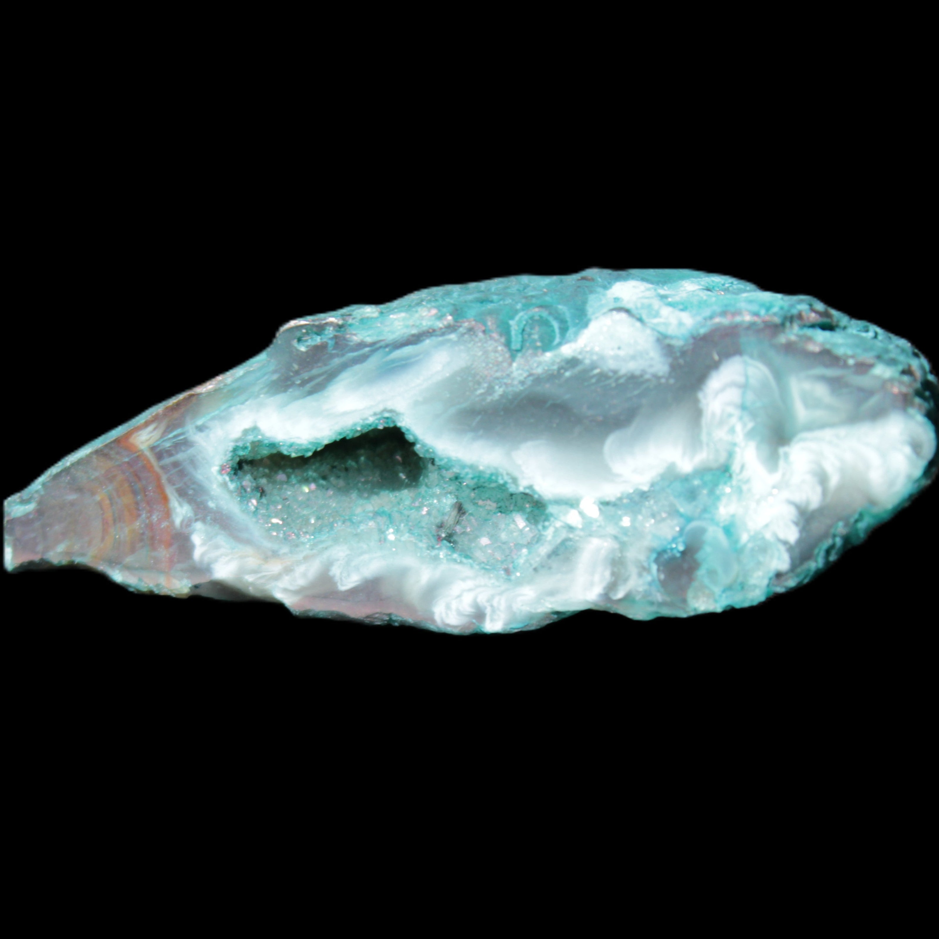 Green dyed Agate geode 45*15*22mm 21g in sunlight - Rocks and Things Store