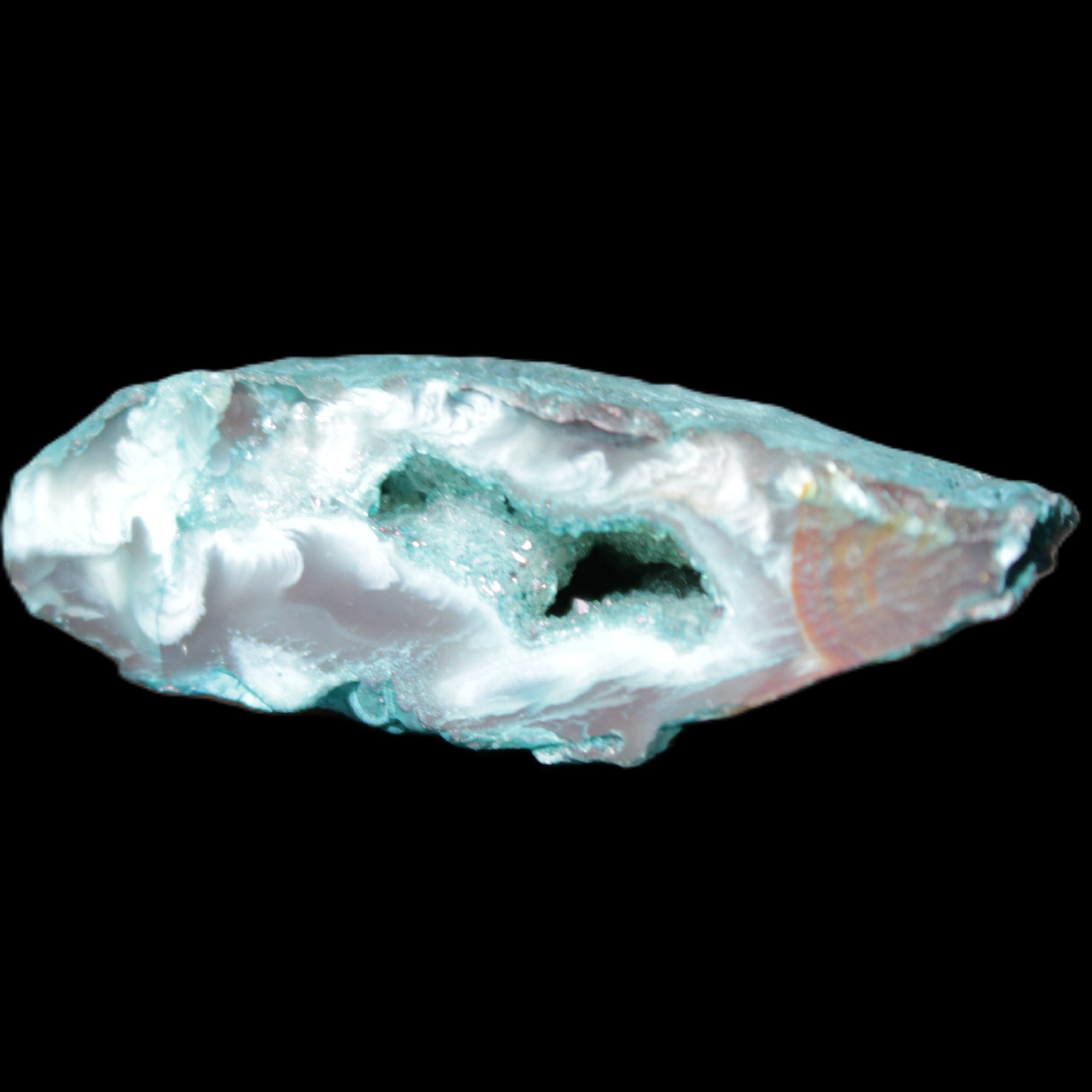 Green dyed Agate geode 45*15*22mm 21g in sunlight - Rocks and Things Store