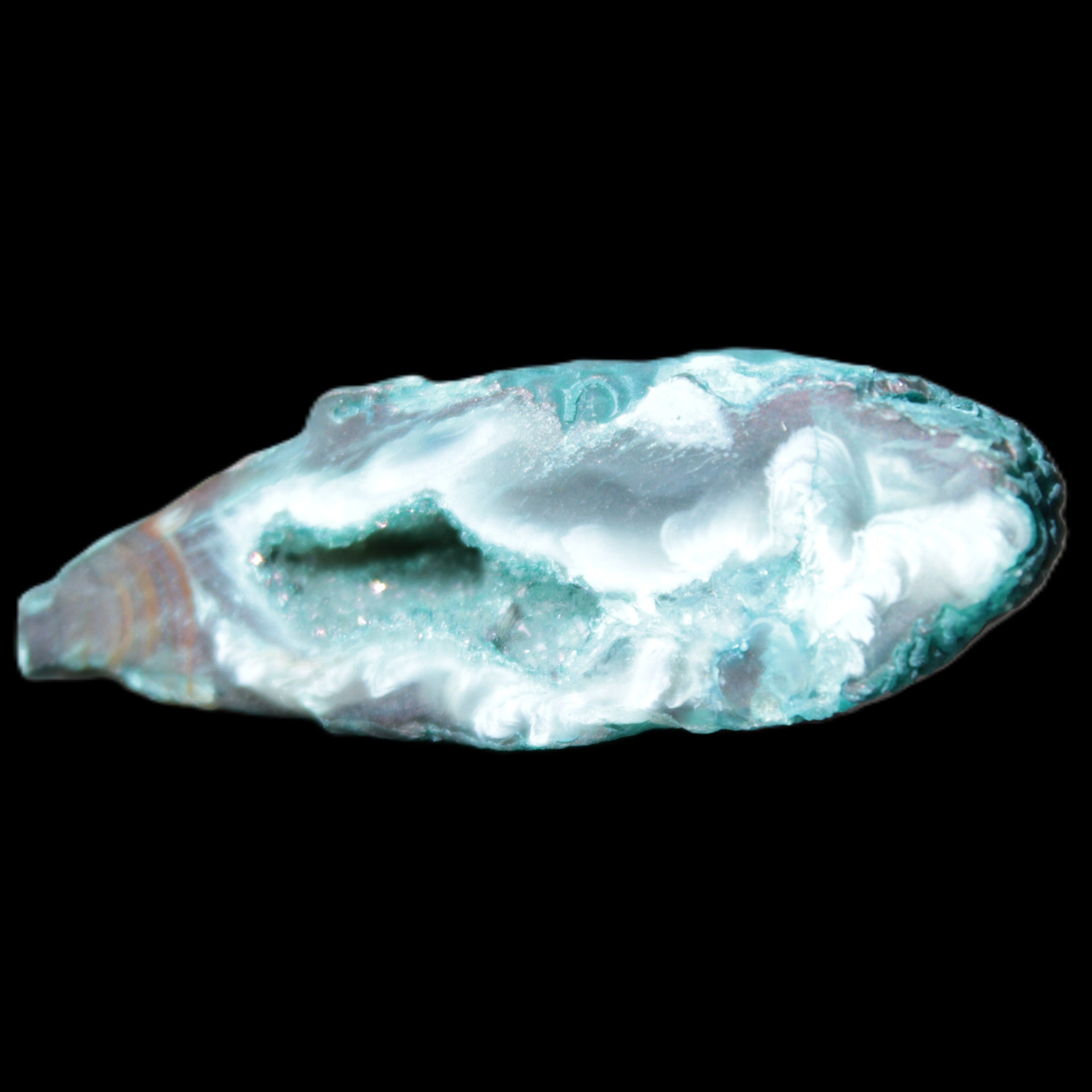 Green dyed Agate geode 45*15*22mm 21g in sunlight - Rocks and Things Store