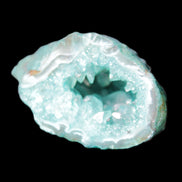 Green dyed Agate geode 50*28*32mm 46g in sunlight - Rocks and Things Store