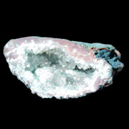 Green dyed Agate geode 51*33*35mm 35g in sunlight - Rocks and Things Store