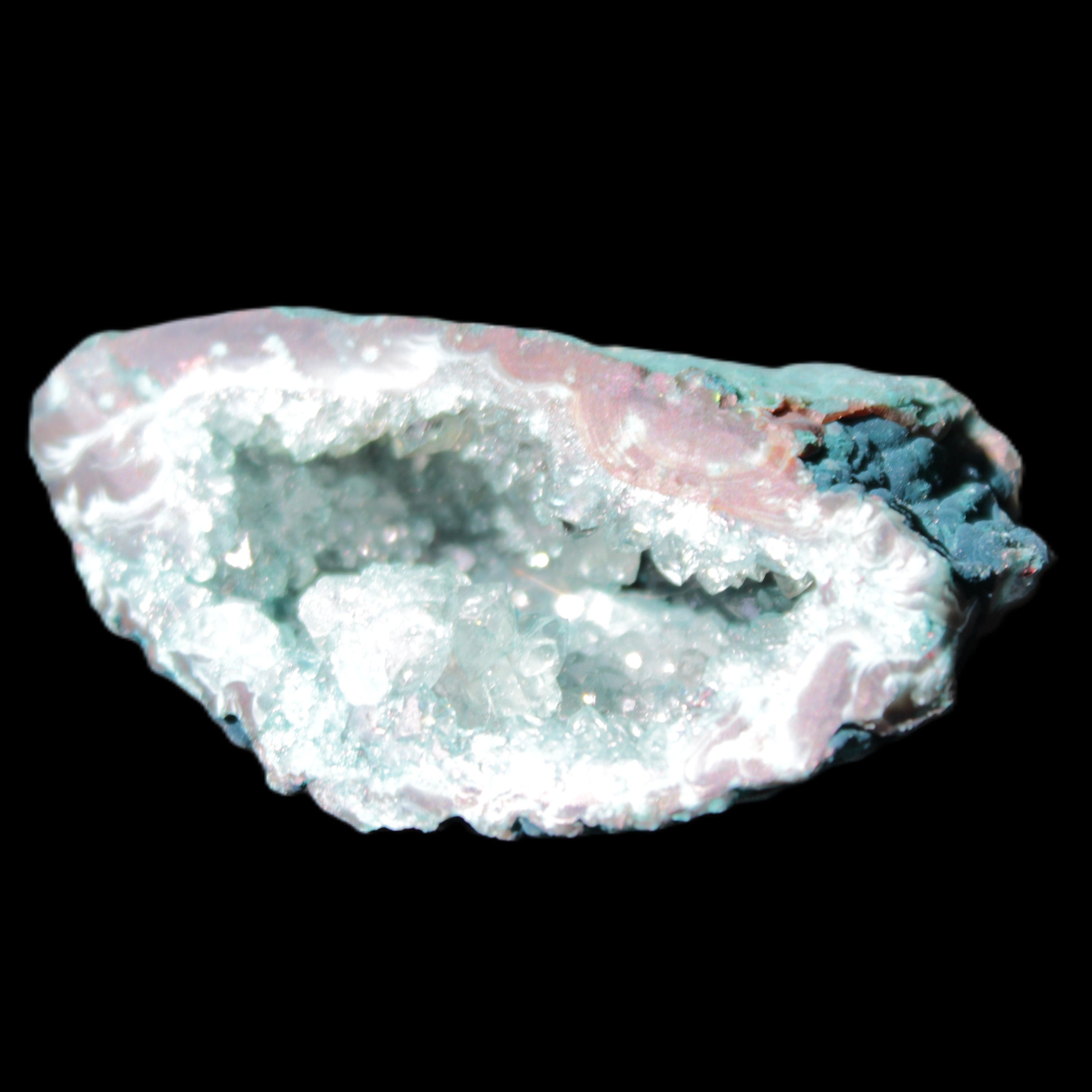 Green dyed Agate geode 51*33*35mm 35g in sunlight - Rocks and Things Store