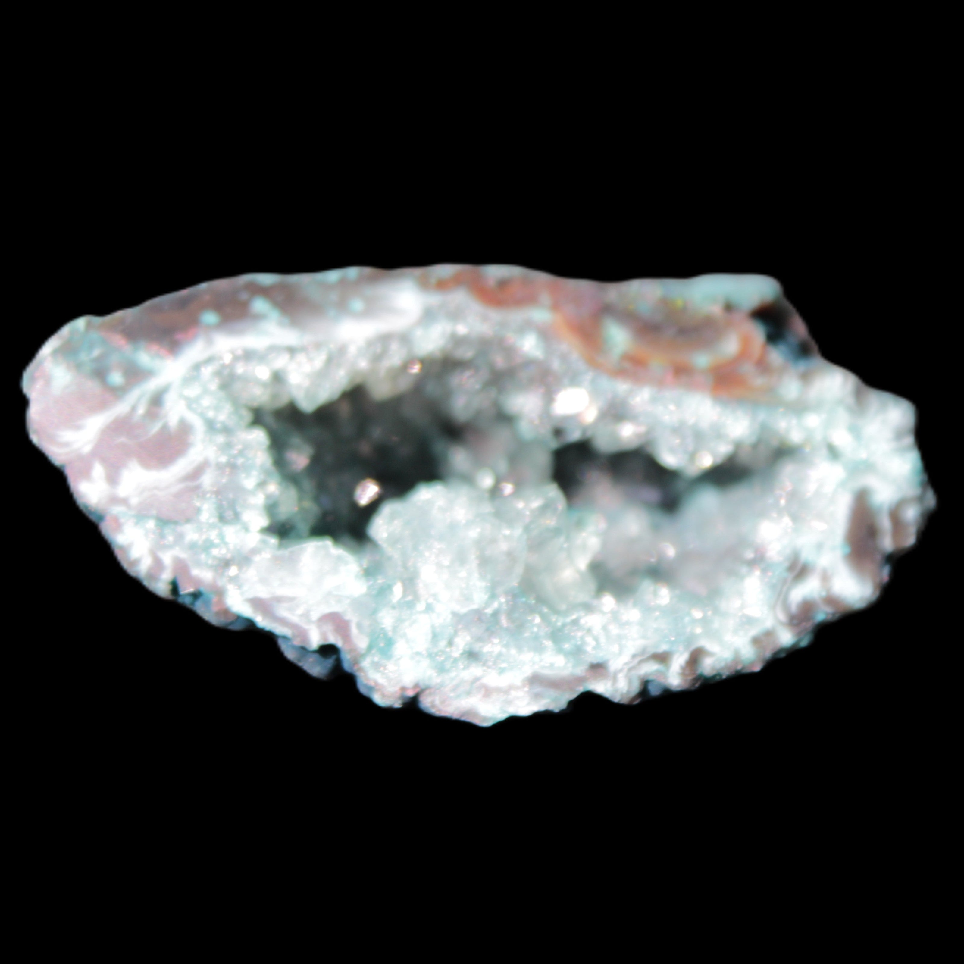 Green dyed Agate geode 51*33*35mm 35g in sunlight - Rocks and Things Store