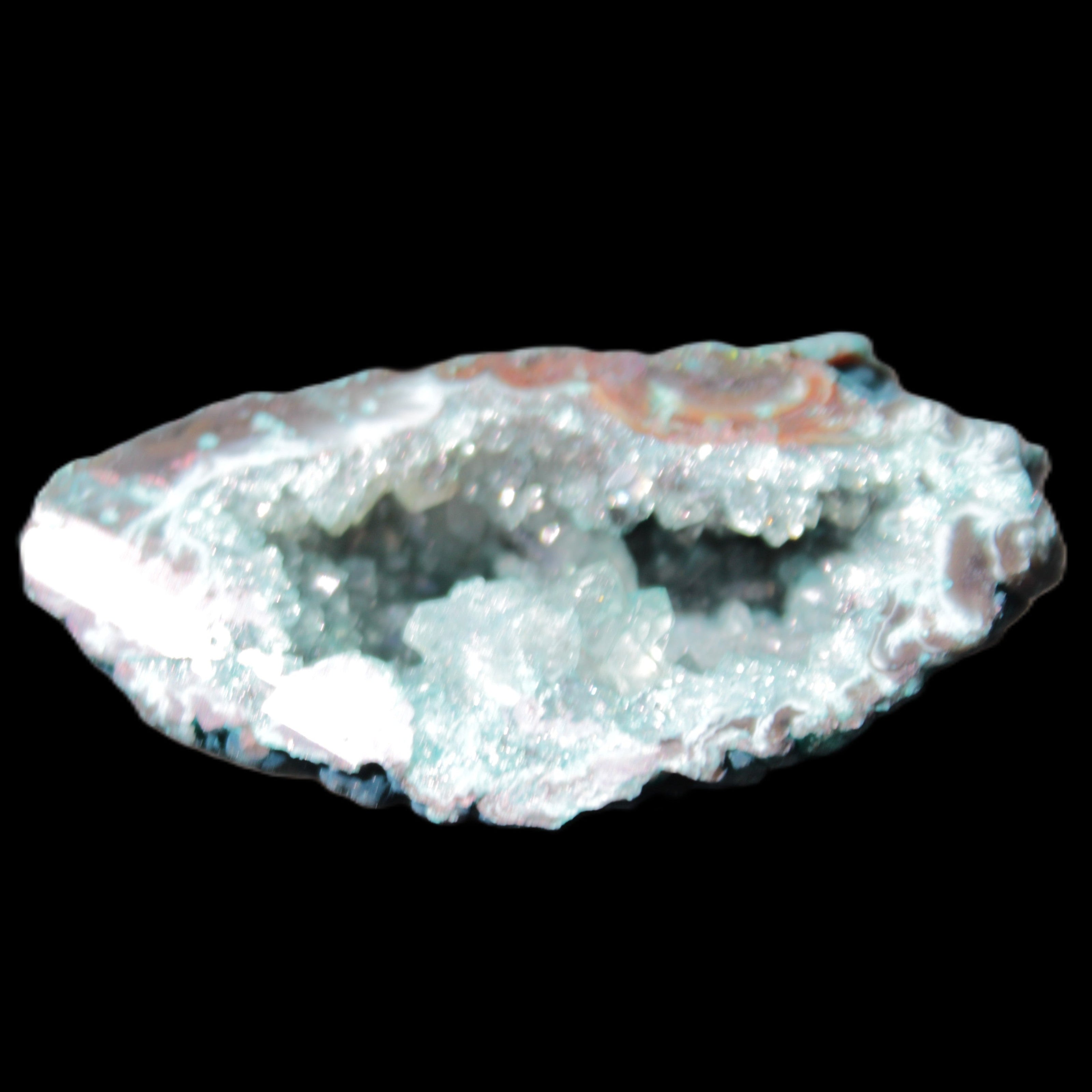 Green dyed Agate geode 51*33*35mm 35g in sunlight - Rocks and Things Store