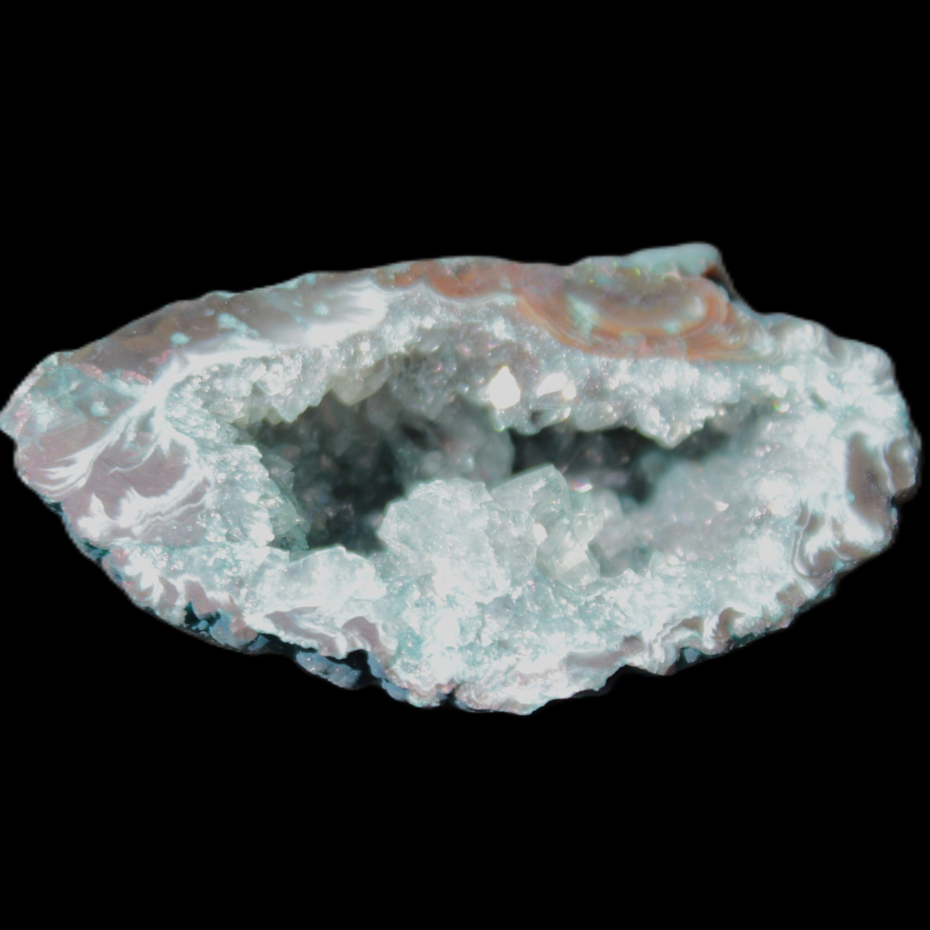 Green dyed Agate geode 51*33*35mm 35g in sunlight - Rocks and Things Store