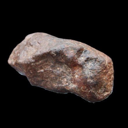 Chondrite Meteorite NWA Unclassified from Erfoud, Morocco 78*40*33mm 212g in sunlight - Rocks and Things Store