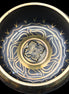 Brass Black Singing Bowl 150*80mm with wooden mallet in sunlight - Rocks and Things Store