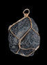 Vesicular Basalt wire-wrapped 30*21*40mm pendant 15g in sunlight - Rocks and Things Store