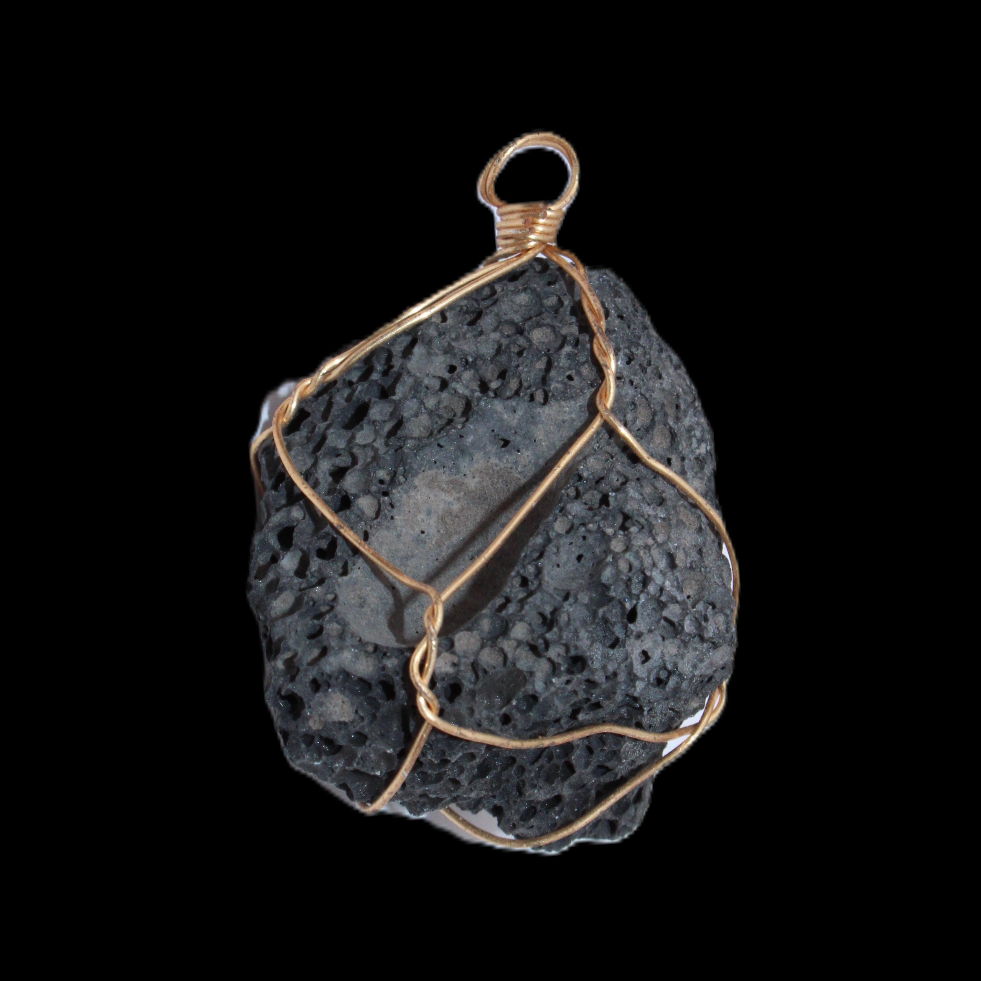Vesicular Basalt wire-wrapped 30*21*40mm pendant 15g in sunlight - Rocks and Things Store