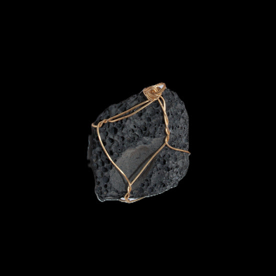 Vesicular Basalt wire-wrapped 30*21*40mm pendant 15g in sunlight - Rocks and Things Store