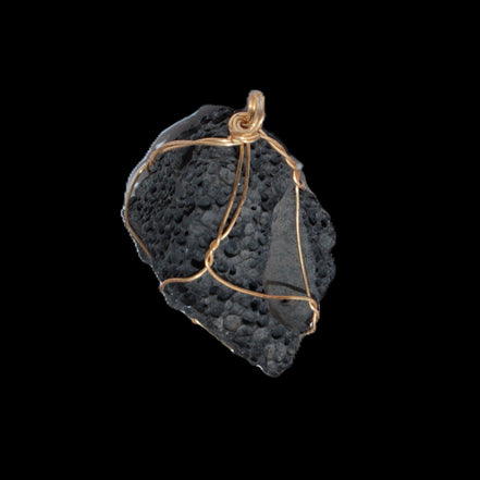 Vesicular Basalt wire-wrapped 30*21*40mm pendant 15g in sunlight - Rocks and Things Store