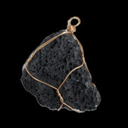 Vesicular Basalt wire-wrapped 30*21*40mm pendant 15g in sunlight - Rocks and Things Store