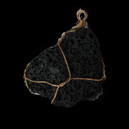 Vesicular Basalt wire-wrapped 30*21*40mm pendant 15g in sunlight - Rocks and Things Store