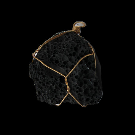 Vesicular Basalt wire-wrapped 30*21*40mm pendant 15g in sunlight - Rocks and Things Store